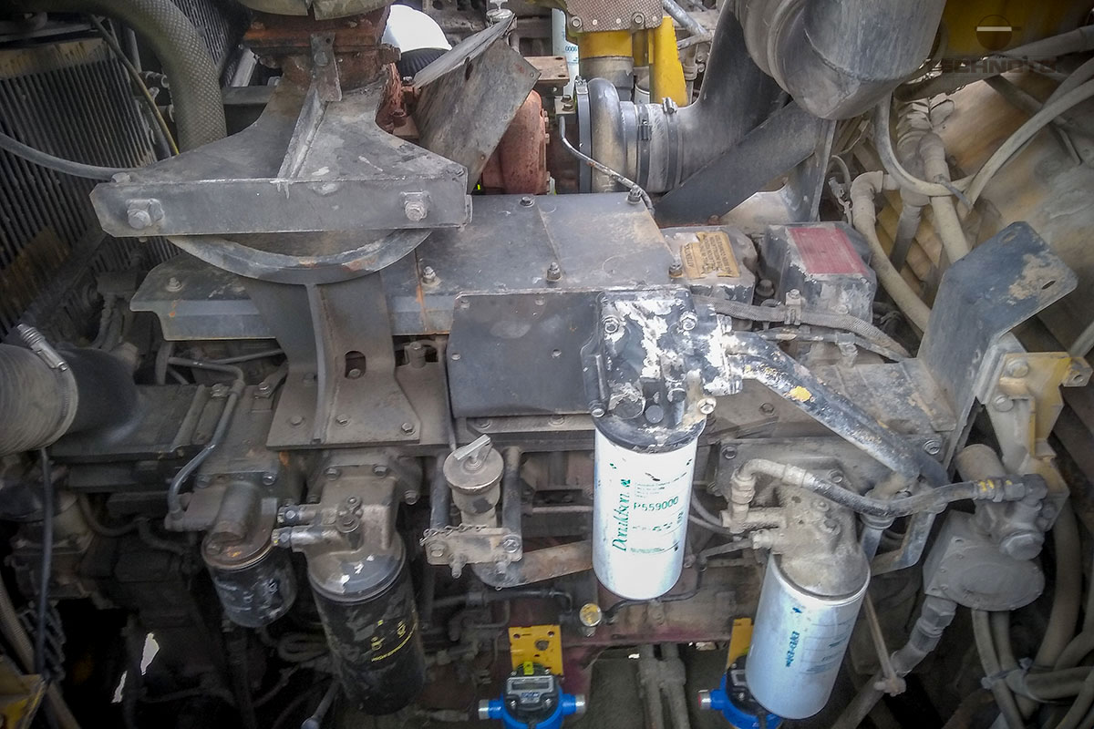 Rear engine fuel system rear of Komatsu and installed flow meters